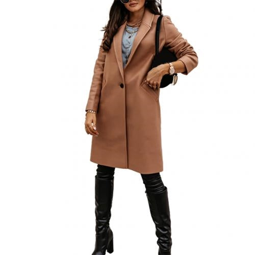 Woman wearing a brown coat and black knee-high boots on a white background