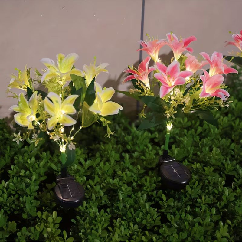 Seven Branch Solar Lily Light: Charges during the day, glows at night. Seven lilies bloom together, soft light flows like water through your garden./Light blue