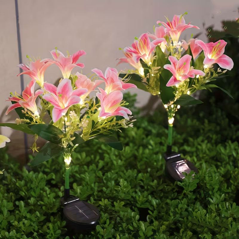 Seven Branch Solar Lily Light: Charges during the day, glows at night. Seven lilies bloom together, soft light flows like water through your garden./Light blue