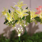 Seven Branch Solar Lily Light: Charges during the day, glows at night. Seven lilies bloom together, soft light flows like water through your garden./Light blue