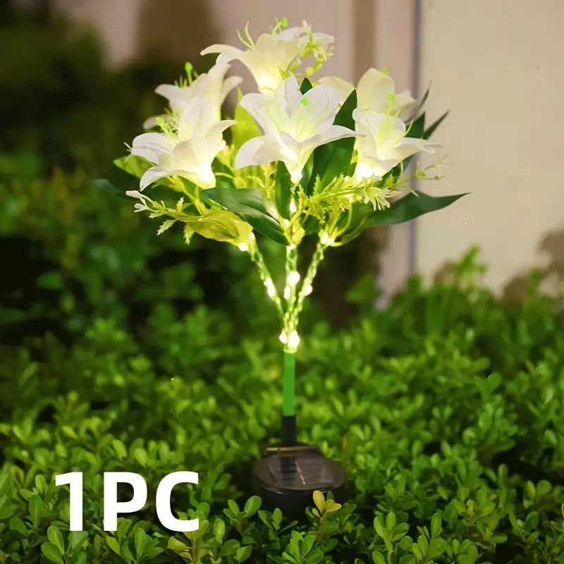 Seven Branch Solar Lily Light: Charges during the day, glows at night. Seven lilies bloom together, soft light flows like water through your garden./Light blue