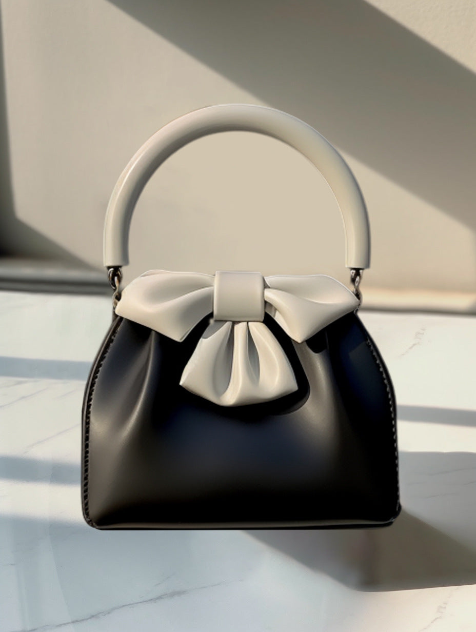 Statement Bow Mini Handbag - Black & White Color Block Top Handle Main image
