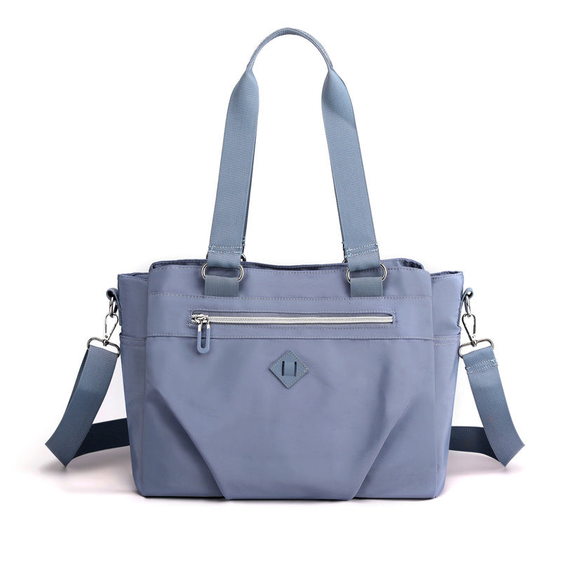 Blue Versatile Water-Repellent Nylon Tote Bag - Lightweight Multi-Pocket Shoulder & Crossbody Handbag Main image