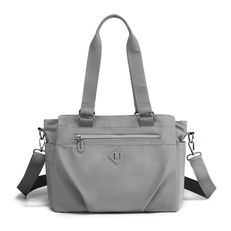 Grey Versatile Water-Repellent Nylon Tote Bag - Lightweight Multi-Pocket Shoulder & Crossbody Handbag Main image